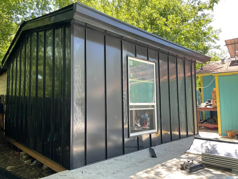 Black standing seam metal wall panels for Metal Roof Installation in Lampasas