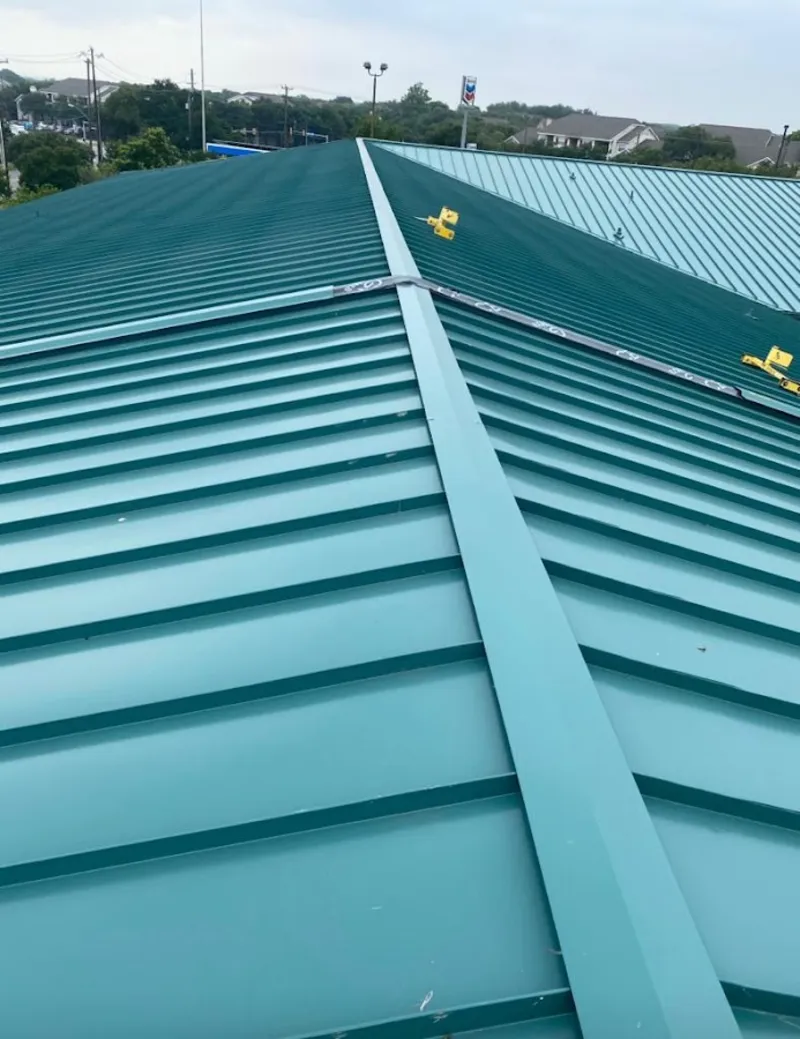 Green commercial metal roof ridge and valley for Metal Roof Repair in Lampasas